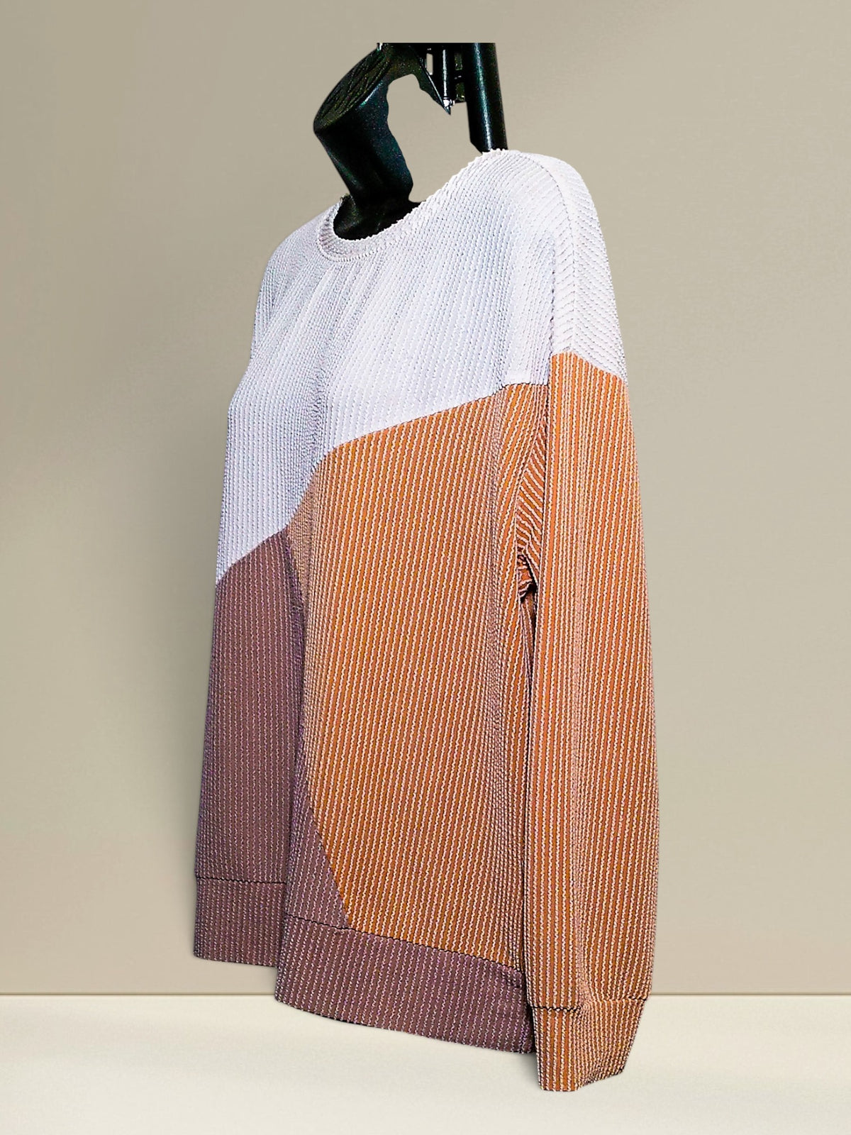 Automet colorblock ribbed knit sweater, close side view of diagonal colorblock design