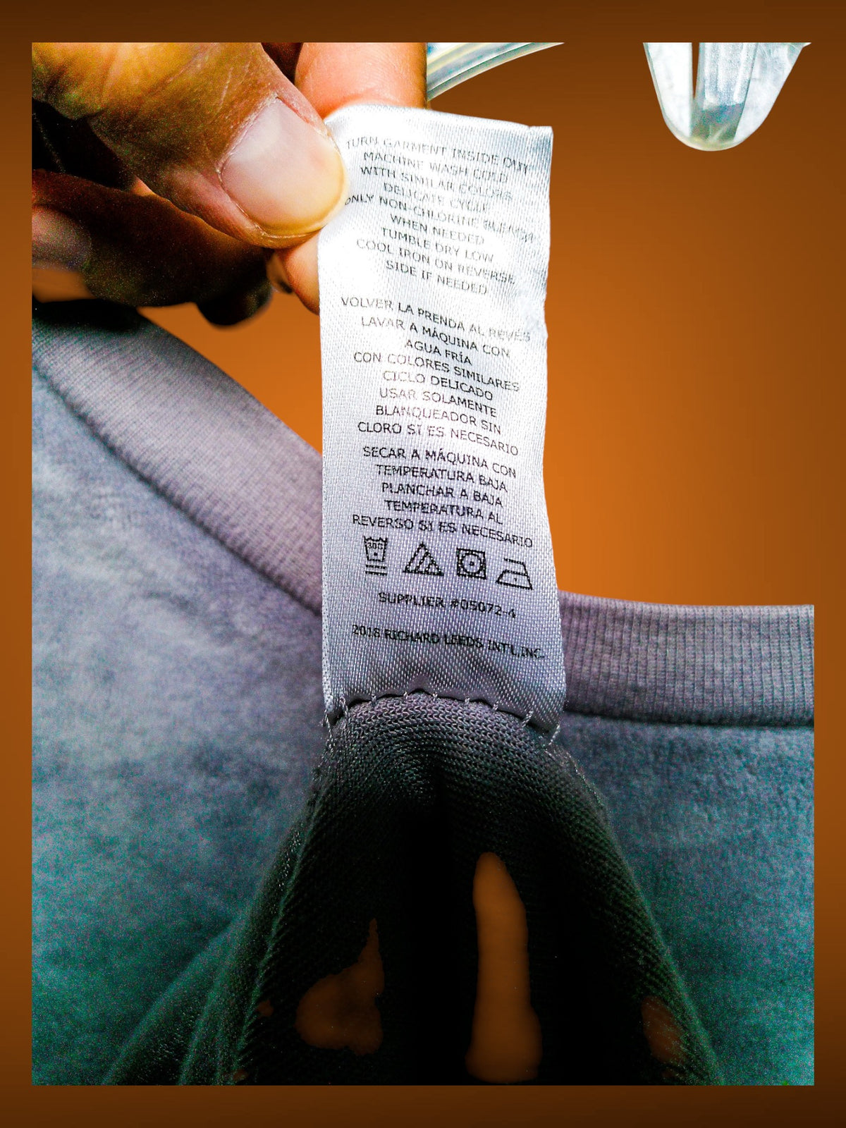 Reverse care label showing washing instructions and Richard Leeds International