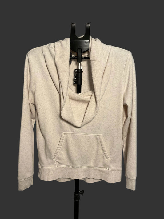 A light beige heathered cowl neck pullover hoodie with a front kangaroo pocket, displayed on a black dress form stand against a gray background.