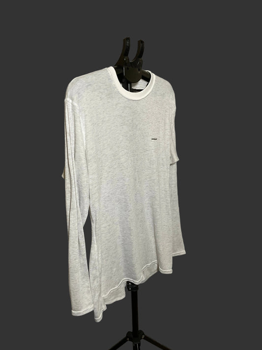 A light gray heather long-sleeve t-shirt with a white crew neck collar, displayed on a black mannequin torso against a dark gray background.