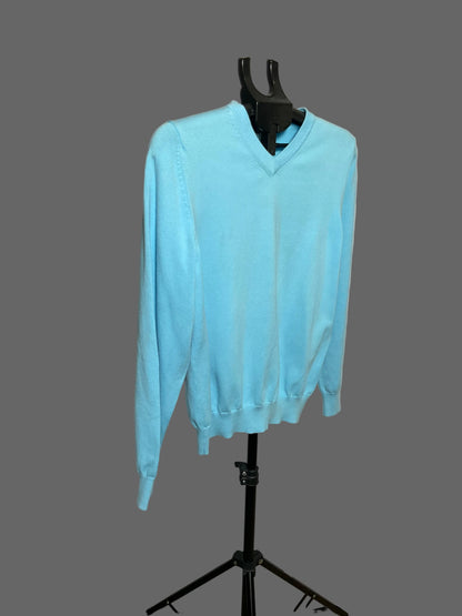 A light blue long-sleeve knit sweater with a V-neck and ribbed cuffs and hem, displayed on a black hanger stand against a white circular studio backdrop.