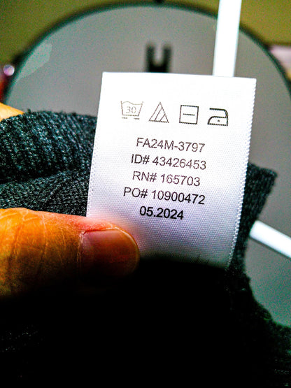 Calligraphy sweater production and care label