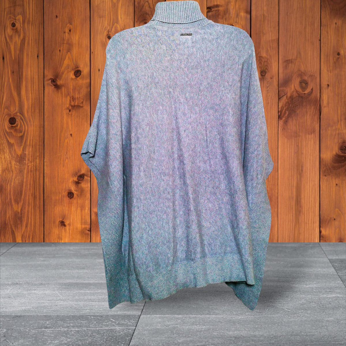 Back view of poncho with ribbed border