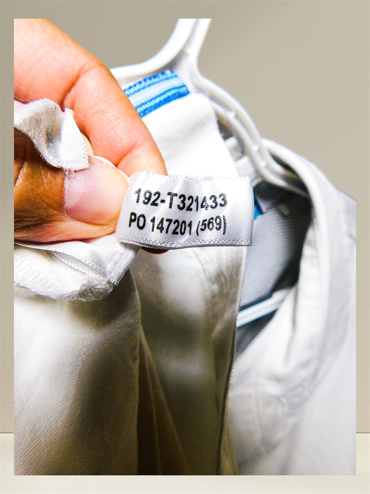 Care label detail showing 85% cotton 15% silk, machine wash cold
