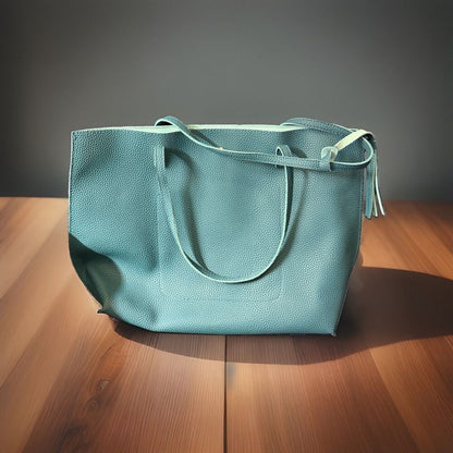 Women's Turquoise Pebbled Shoulder Bag w/ Tassel, Snap Closure, Inner Pockets