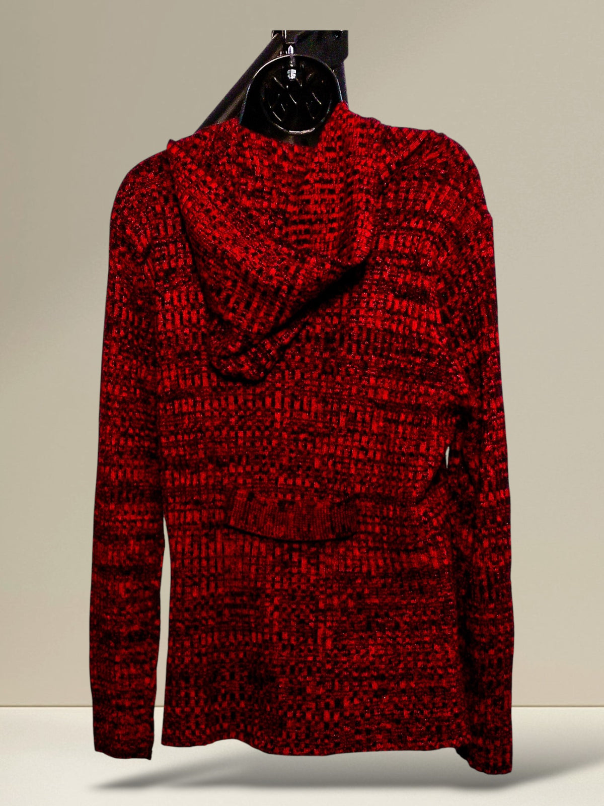 Back view of the cardigan jacket showing the attached shawl hood